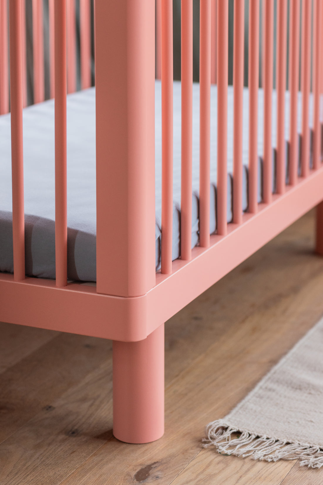 Nox cot in pink + conversion rail in pink