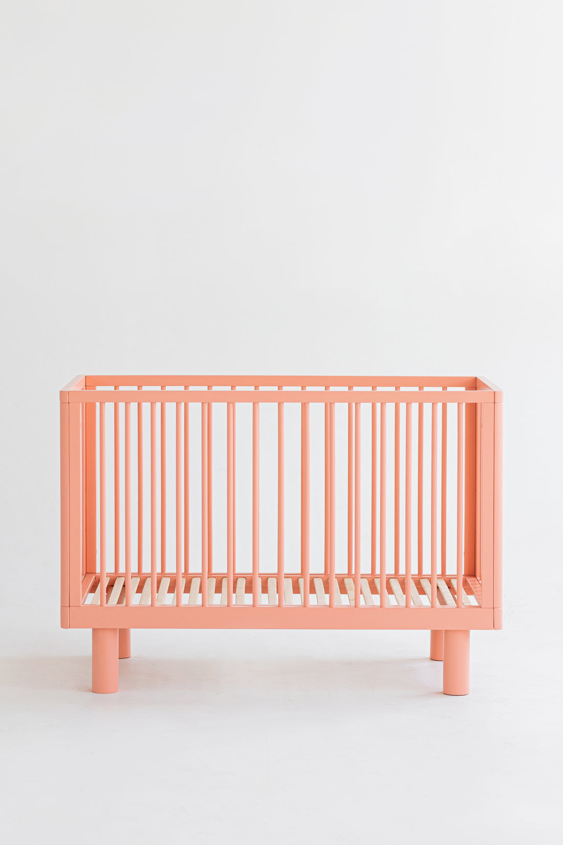 Nox cot in pink + conversion rail in pink