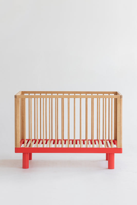 Nox cot in natural wood and red