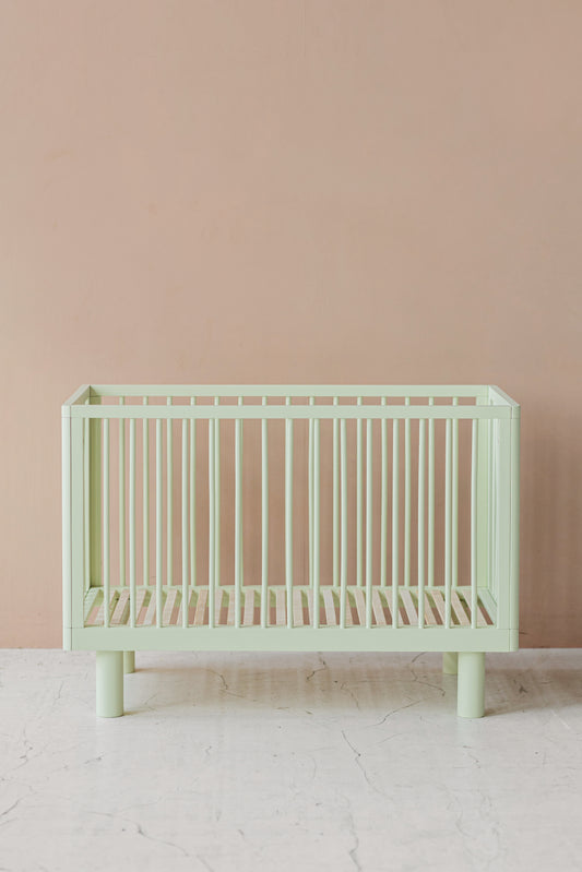 Nox cot in pistachio + conversion rail in pistachio